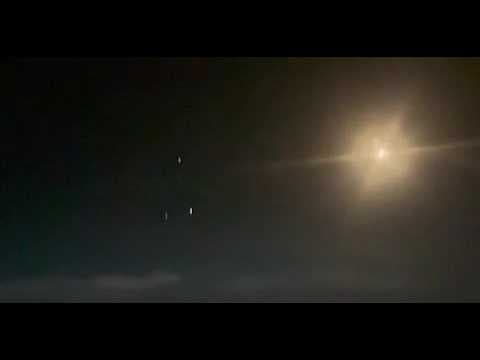 Multiple orbs seen from airplane on the way to New Zealand